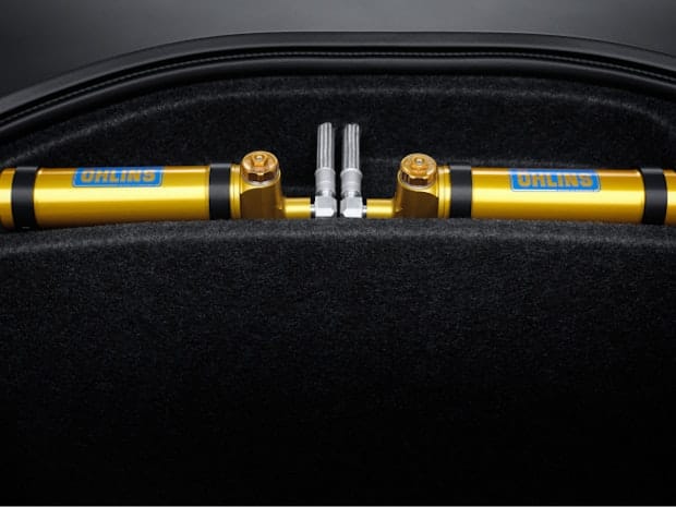 Golden Öhlins dampers in felted compartement